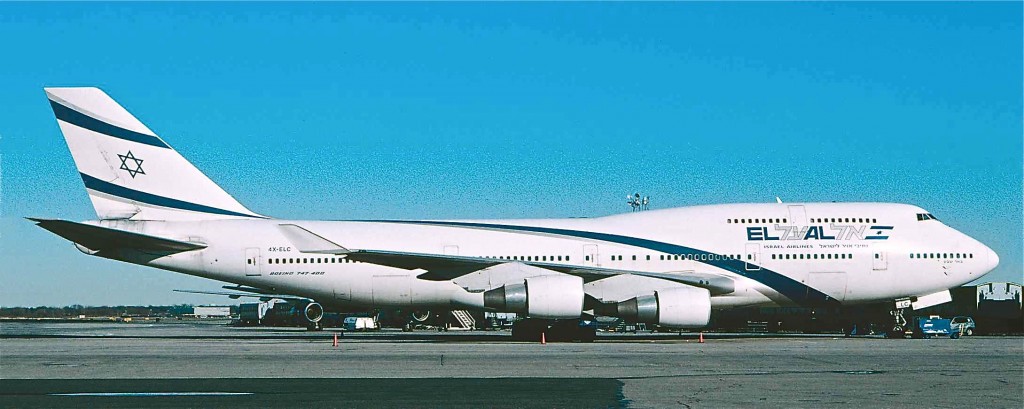 747-400 4X-ELC (named ‘Be’er Sheva’) at New York-JFK, December 2003 (Joe Pries photo). Here we see EL AL’s current livery, featuring blue and silver ribbons and a swept up Israeli flag on the tail, introduced in 1999.
