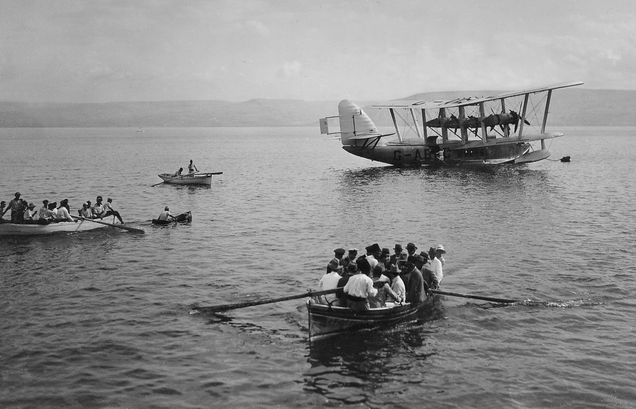 The first airline to operate in the Holy Land was Britain’s Imperial Airways. Pictured is Short S.17 Kent G-ABFC Satyrus on the Sea of Galilee (Lake Kinneret) at Tiberias, on 21 October 1931, operating the first flight using this transit point linking Imperial’s service between England and India. Passengers deplaned by rowboat and were then driven to Tzemakh, where they would continue their journey by landplane. (American Colony Photo Department—Jerusalem, via US Library of Congress) 