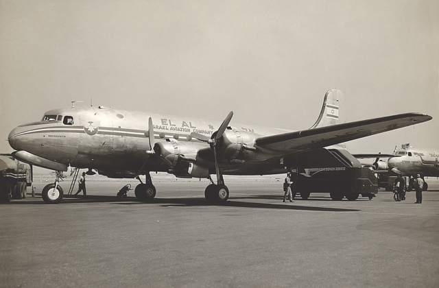 One of the first two DC-4s purchased by EL AL, 4X-ACC Rechovoth, acquired from American Airlines, at Idlewild Airport (now John F. Kennedy International Airport), New York, 29 March 1949, before takeoff for Tel Aviv on EL AL's first survey flight across the Atlantic. The six-pointed Star of David with flying wings to the right of the cockpit window became EL AL's main symbol on its aircraft and advertising material until1962. (Worldwide Photo)