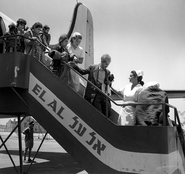 In 1950-51, EL AL airlifted 113,000 Jews from Iraq to Israel in Operation Ali Baba. As Israeli-marked aircraft were not permitted to land in Iraq, foreign-registered planes of other airlines were chartered, although with EL AL crew. Shown are Iraqi Jews disembarking 1 May 1951 from a DC-4 of Near East Air Transport bearing the Cuban registration CU-T-465. This aircraft later became 4X-ADC of EL AL. (Israel Government Press Office, Teddy Brauner photographer) 