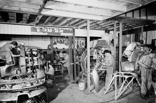 EL AL maintenance shops at Lod Airport, April 1951. The staff are working on Pratt & Whitney R-2000 engines which powered the Douglas DC-4. (Israel Government Press Office)