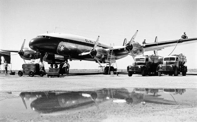 Refueling a Constellation at Lod Airport, April 1951. Unlike underwing pressure hoses used today, refueling in the piston-engine era was by overwing gravity methods. (Israeli Government Press Office)