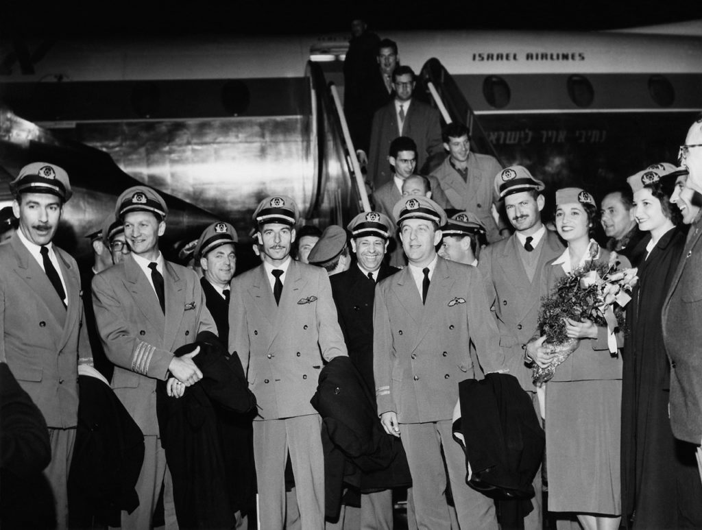 Celebration at Lod Airport upon arrival of EL AL Britannia 4X-AGC on a proving flight from New York to Tel Aviv, 19 December 1957, the first nonstop flight ever on this route. The pictured uniforms were changed to new ones in navy upon the start of Britannia scheduled service soon thereafter. (EL AL Archive)