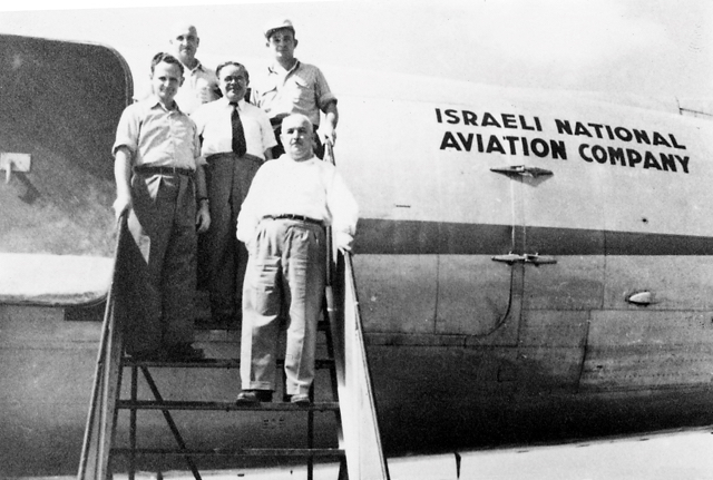 Founders of Israeli aviation transport on the steps leading to 4X-ACA prior to the Weizmann flight at Ekron Air Base, Israel, about 26 September 1948. Left to right: Munya Mardor, head of the Israel Air Transport Command; Uri Michaeli, head of the Jewish airline Aviron in the 1940s and the first head of civil aviation with the Transport Ministry after Israel became a state; Bar-kochba Meerovitch, Deputy Minister for sea and air transport within the Transport Ministry; Aharon Remez, early Commander of the Israeli Air Force; and (front right) David Remez, Minister of Transport, who selected the biblical words "EL AL" as the name of the airline. (Capt. Yitzhak Hennenson collection) 