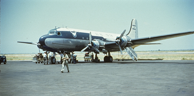 In May 1950 EL AL purchased two DC-4s from United Air Lines (registered in Israel as 4X-ADB and 4X-ADC) and conveniently adopted the UAL paint scheme: a blue window line rising in steps towards the front. Using these aircraft EL AL started charter flights between New York and Tel Aviv, with intermediate stops in Europe. Pictured is 4X-ADB at Lod Airport, 1950 (Judge Alfred Kleiman photo)