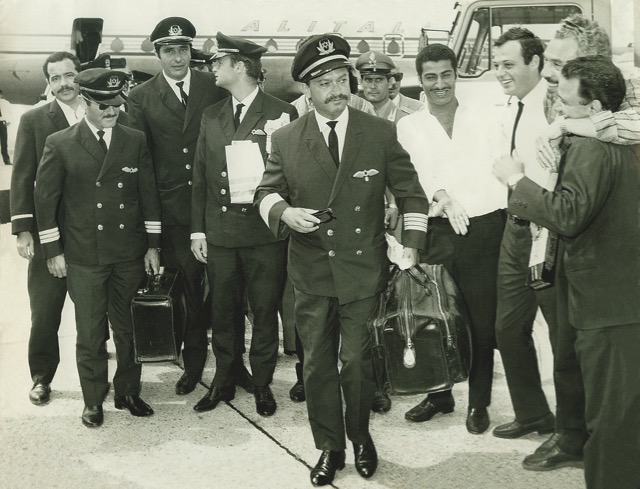 Following the hijack by Arab terrorists of an EL AL 707 (4X-ATA) to Algiers in 1968, the crew was held in custody by the Algerian government for 40 days until released and flown in an Alitalia aircraft to Rome. Here an emotional welcome at Rome greets Capt. Oded Abarbanel and the other released crew members. (EL AL)